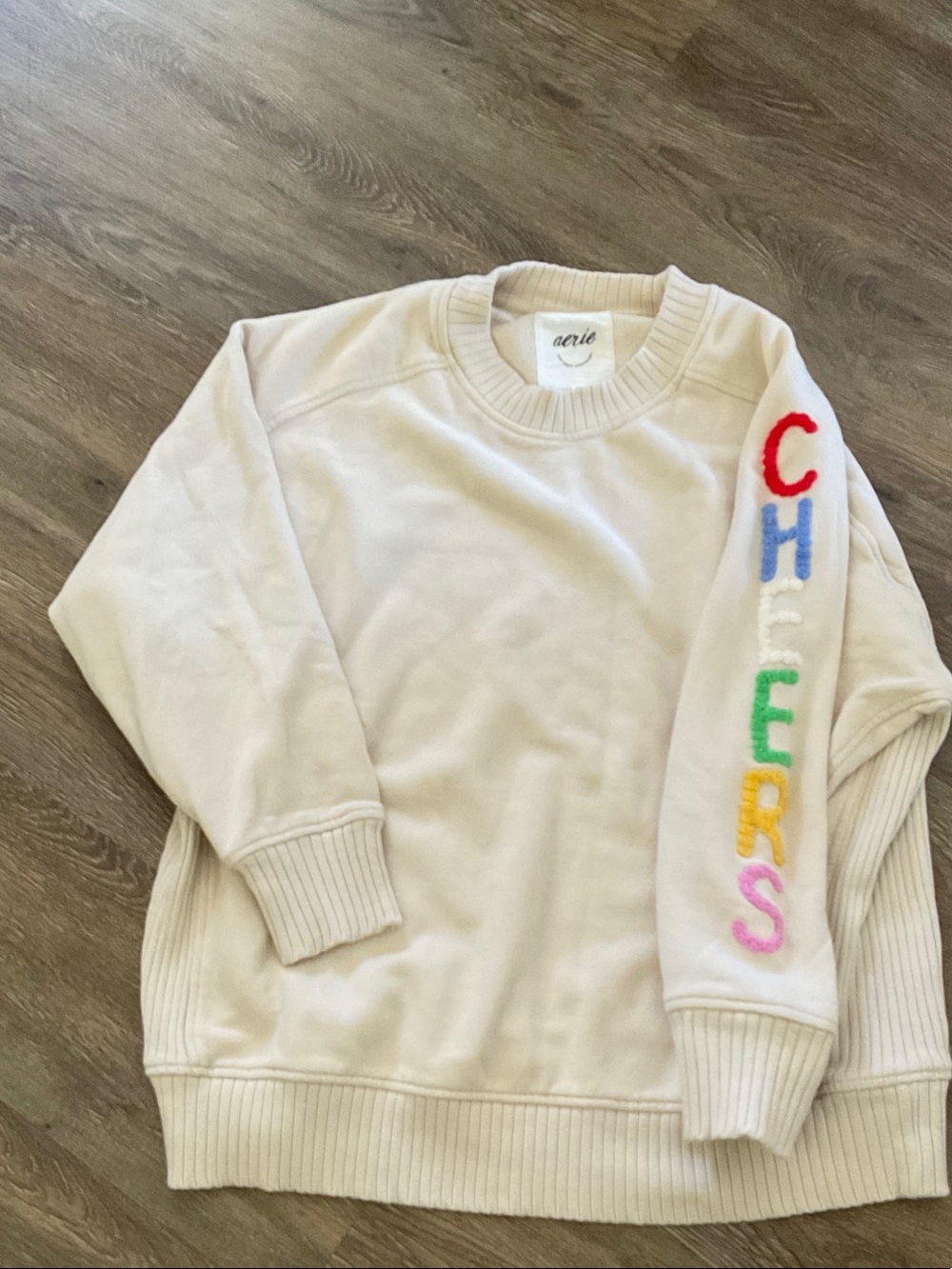 aerie Cream Crewneck Sweater with Multicolor 'CHEERS' Sleeve